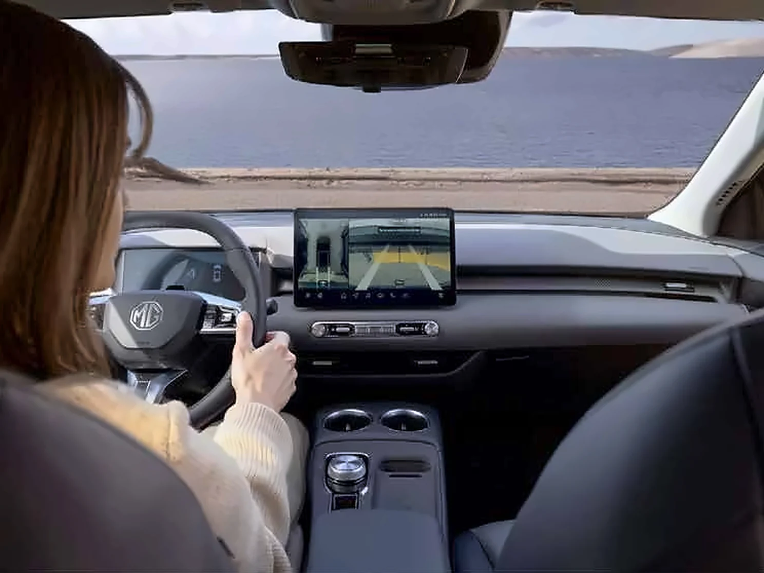 Driver using the 360 degree camera view on the touchscreen Driver using the 360 degree camera view on the touchscreen